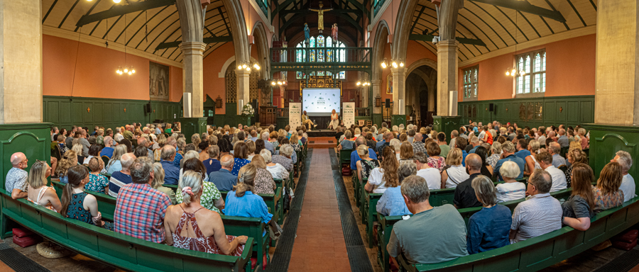 A sell-out crowd for Clive Myrie talking to Clare Clark at the 2023 Chiswick Book Festival