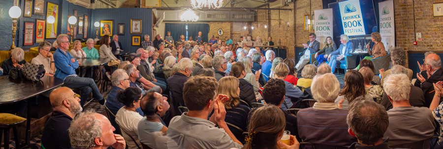 Packed-out  Chsiwick Book Festival session on  the History of the Middle East session at the George IV, with (l-r) Peter Oborne (The Fate of Abraham),  Palestinian-British filmmaker and TV producer Leila Sansour, historian Eugene Rogan (The Damascus Events: The 1860 Massacre and the Destruction of the Old Ottoman Wall) chaired by BBC journalist Jo Coburn.